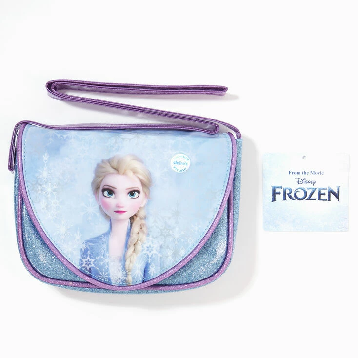 Brand new 👏 Claire's ©Disney Frozen Purple Glittery Elsa Crossbody Bag 🛒 1 Brand new 👏 Claire's ©Disney Frozen Purple Glittery Elsa Crossbody Bag 🛒